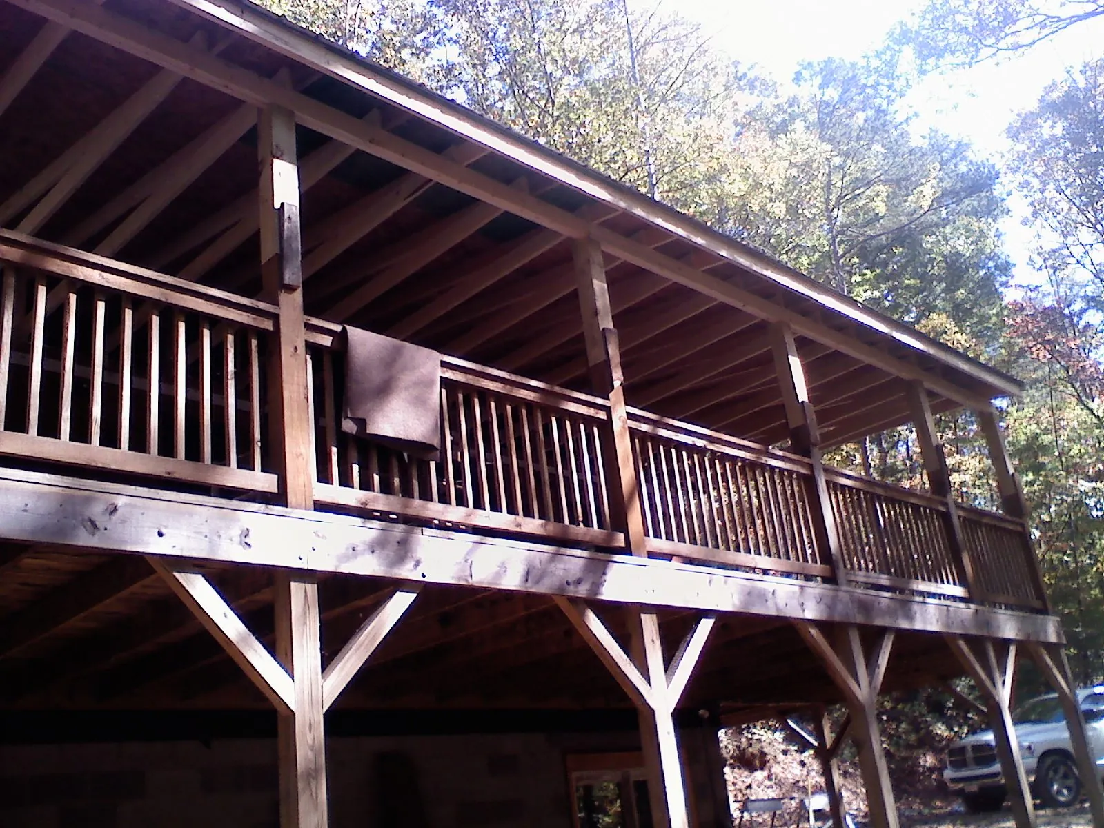 Timber framing under a new elevated porch and deck — Roof Leak Repair in Arvonia by Roofing Brothers